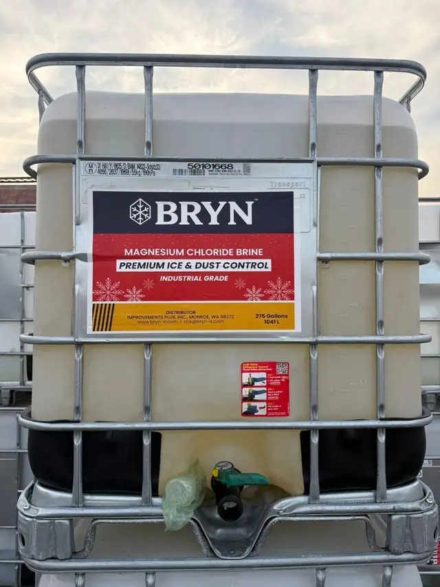 A 275 gallon IBC tote of Bryn Magnesium Chloride Brine, label legible